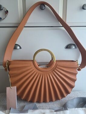 ALKEMĒ ATELIER WATER MOON Satchel Bag with Gold Metal Ring .